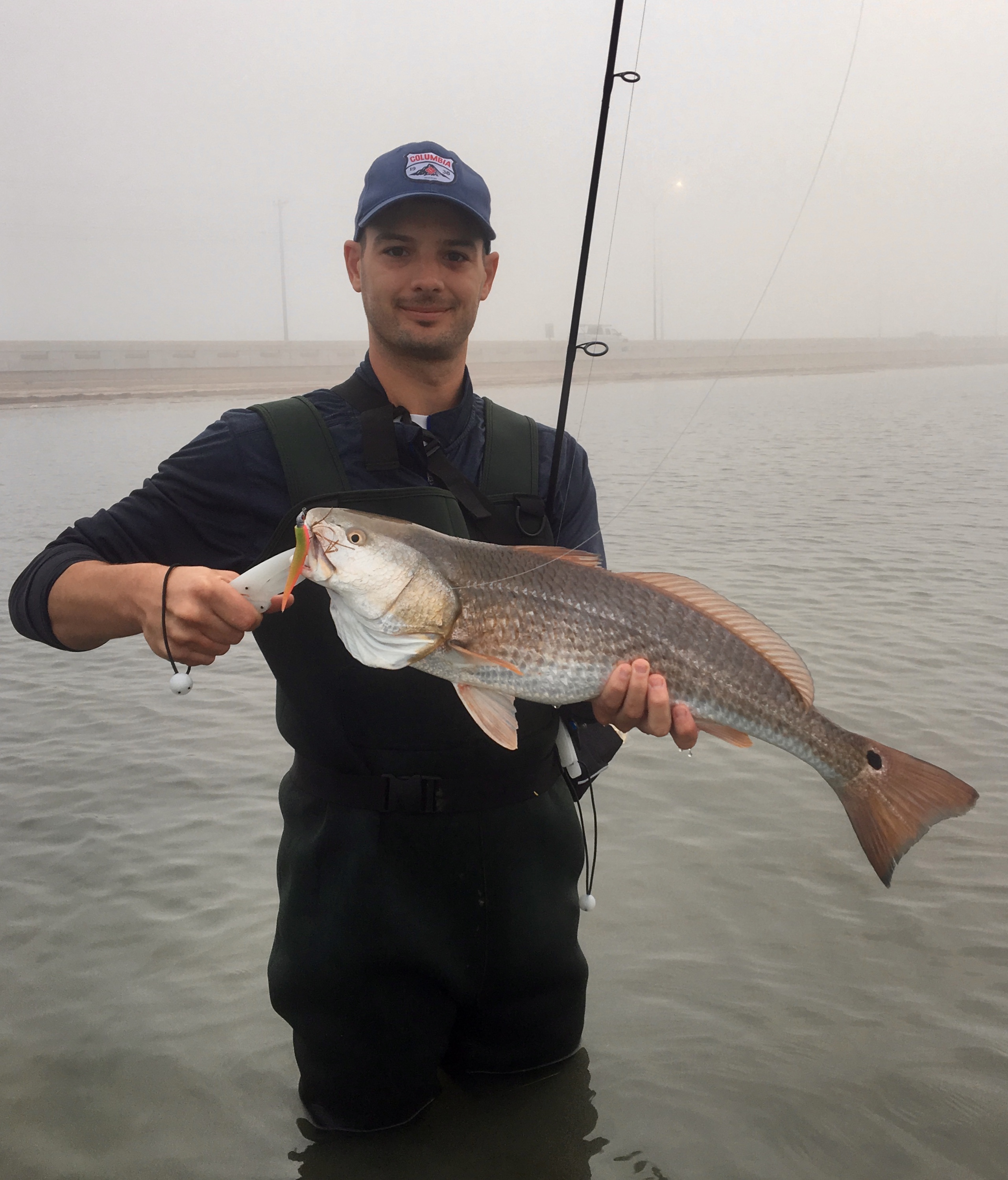 wade fishing redfish