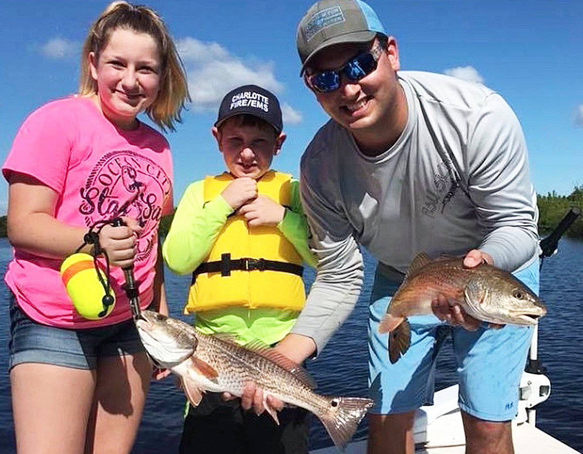 kids fishing for redfish